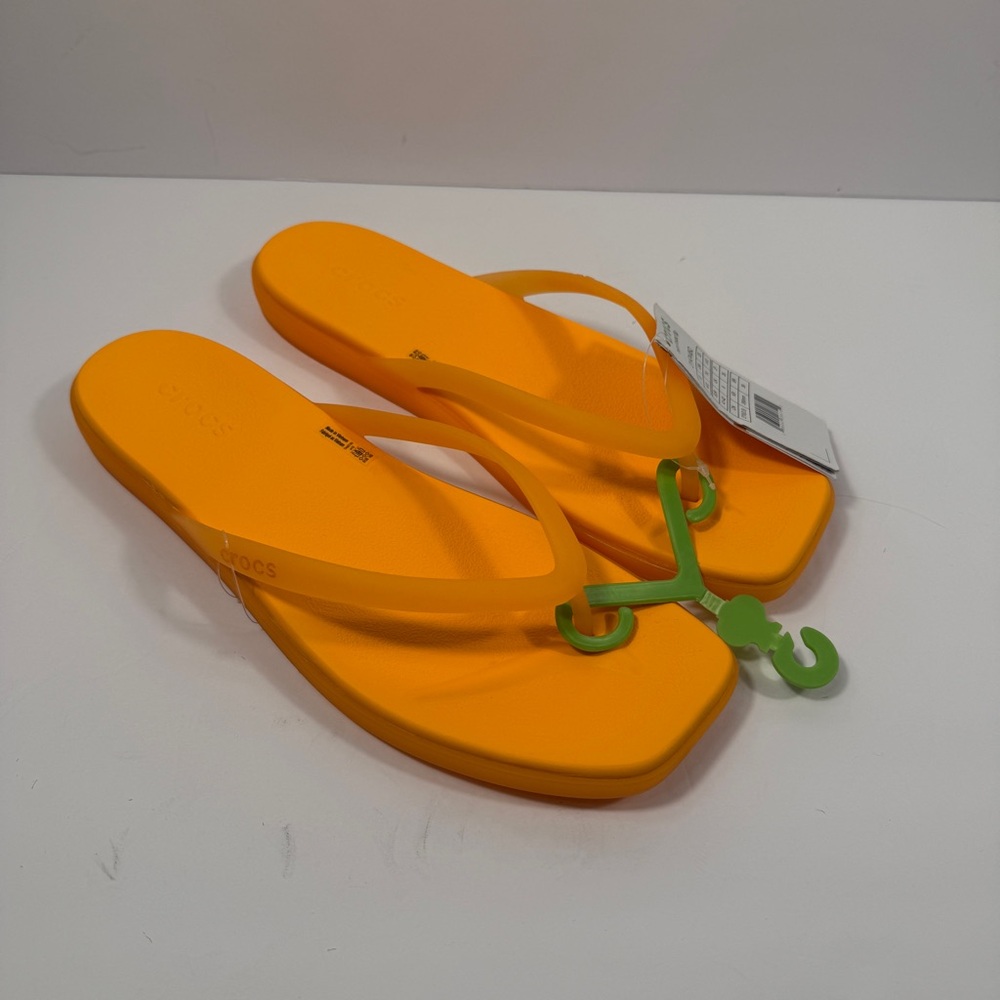 CROCS Women's Bright Orange Flip Sandals with Green Hanger
